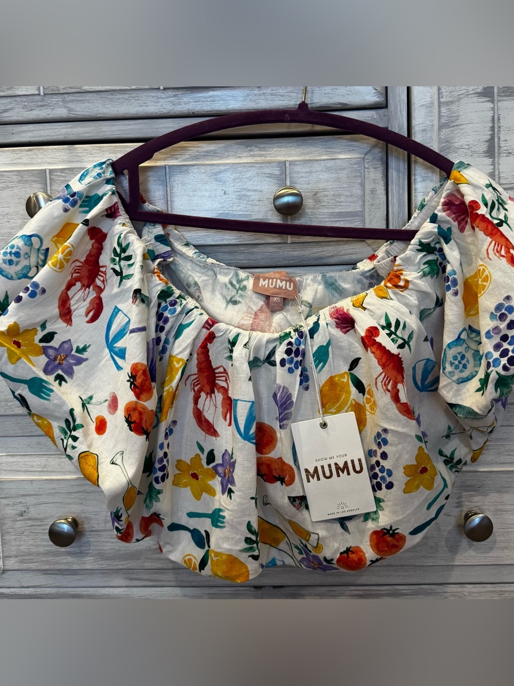 Mumu Women's White Off-Shoulder Crop Top with Colorful Seafood & Fruit Print